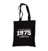 1975 Aged to Perfection Black Canvas Totebag - Premium  from W.E.N.S. WIND - Just 4990! Shop now at W.E.N.S. WIND