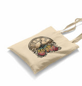 A Vintage Clock and a Colorful Butterfly White Canvas Totebag - Premium  from W.E.N.S. WIND - Just 4990! Shop now at W.E.N.S. WIND