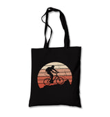 Man Riding Bicycle on the Mountain Canvas Totebag - Premium  from Wenswind - Just 4990! Shop now at W.E.N.S. WIND